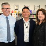 John Vargas visits Mara Aleardi's Economics class